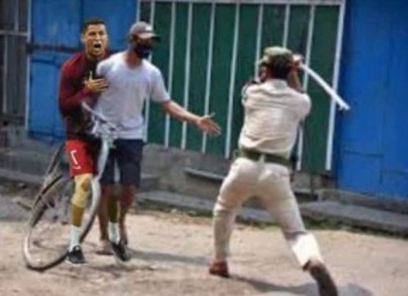 Kocak, Beredar Foto Cristiano Ronaldo Langgar Lockdown India Dipukul Rotan (Foto:@TroolFootball)