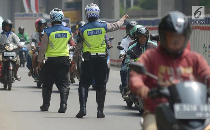 Ilustrasi Polisi Lalu Lintas Sedang Bertugas (Foto:Istimewa)