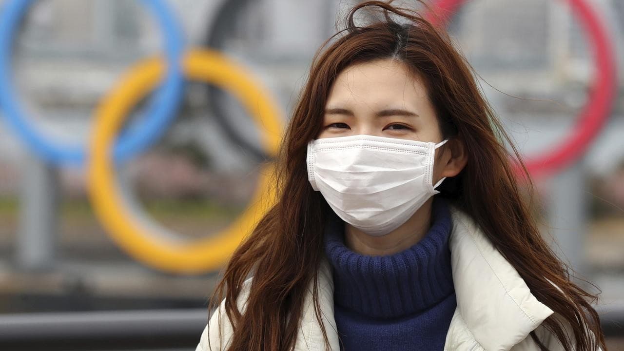 Orang memakai masker (Foto: Istimewa)