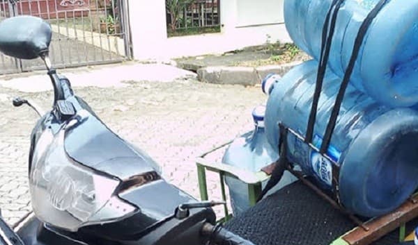 Ilustrasi Tukang Antar Galon (Foto:Istimewa)