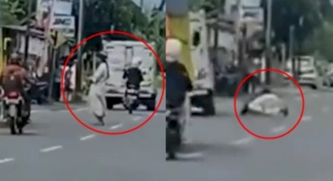 Heboh Pria Berjubah Putih Nekat Salat di Tengah Jalan, Auto Dicibir Warganet: Sholat on the road?