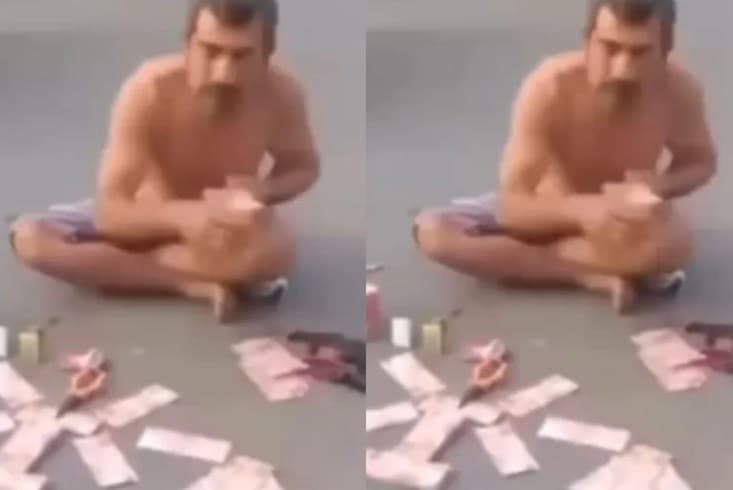 Viral pria sebar uang Rp 350 juta di tengah jalan.